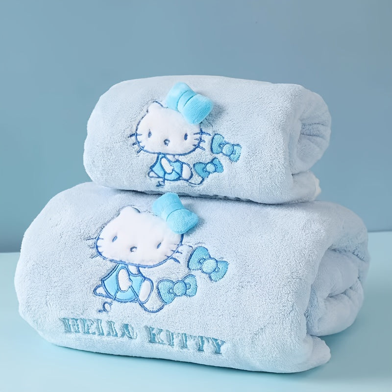 A Set of Three Sanrio Towels Themed Around for Hello Kitty, Including Bath Towels, Face Towels, And a Hair Drying Cap, All Showcasing a Three-Dimensional for Hello Kitty Design