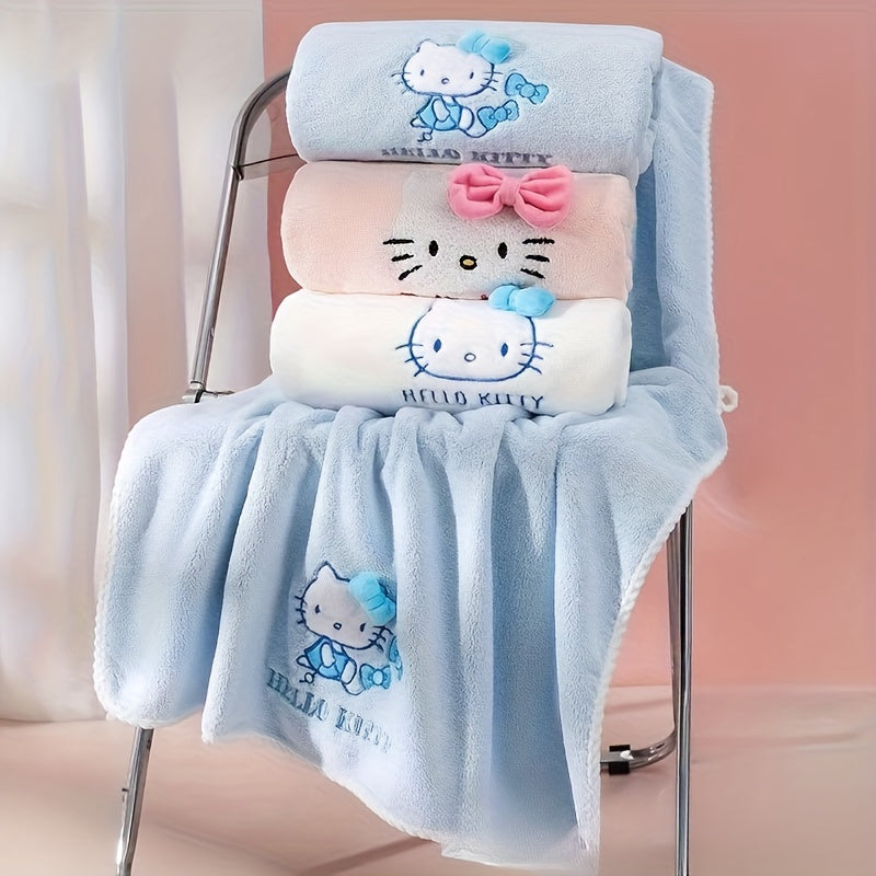 A Set of Three Sanrio Towels Themed Around for Hello Kitty, Including Bath Towels, Face Towels, And a Hair Drying Cap, All Showcasing a Three-Dimensional for Hello Kitty Design
